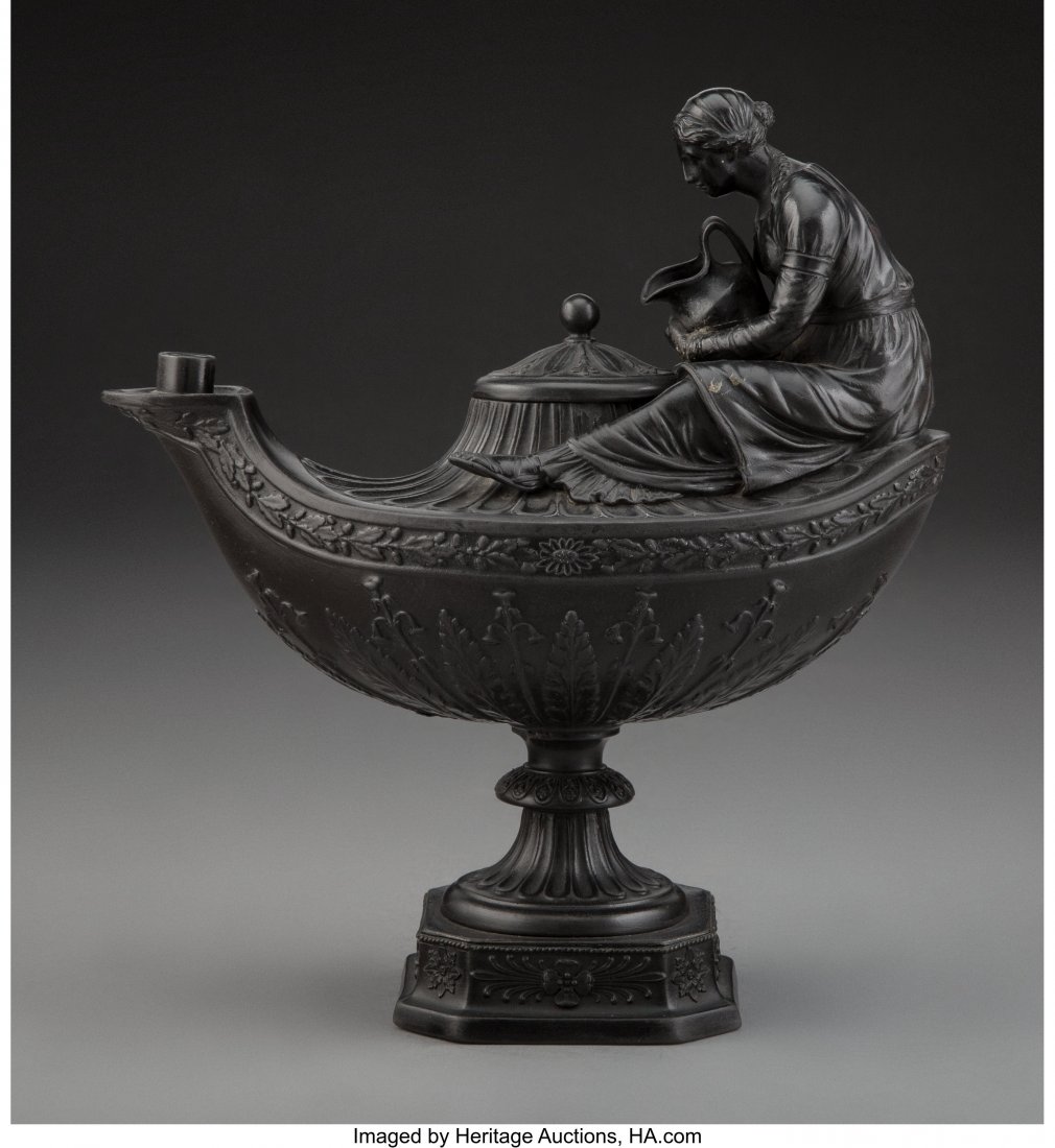 A Wedgwood Black Basalt Oil Lamp and Cover, Engl: A Wedgwood Black Basalt Oil Lamp and Cover, England, 1874 Marks: WEDGWOOD, C 8 x 8-1/2 x 4-1/4 inches (20.3 x 21.6 x 10.8 cm) PROPERTY FROM THE SIR ARTHUR BRYAN COLLECTION The basalt oil lamp, with fl