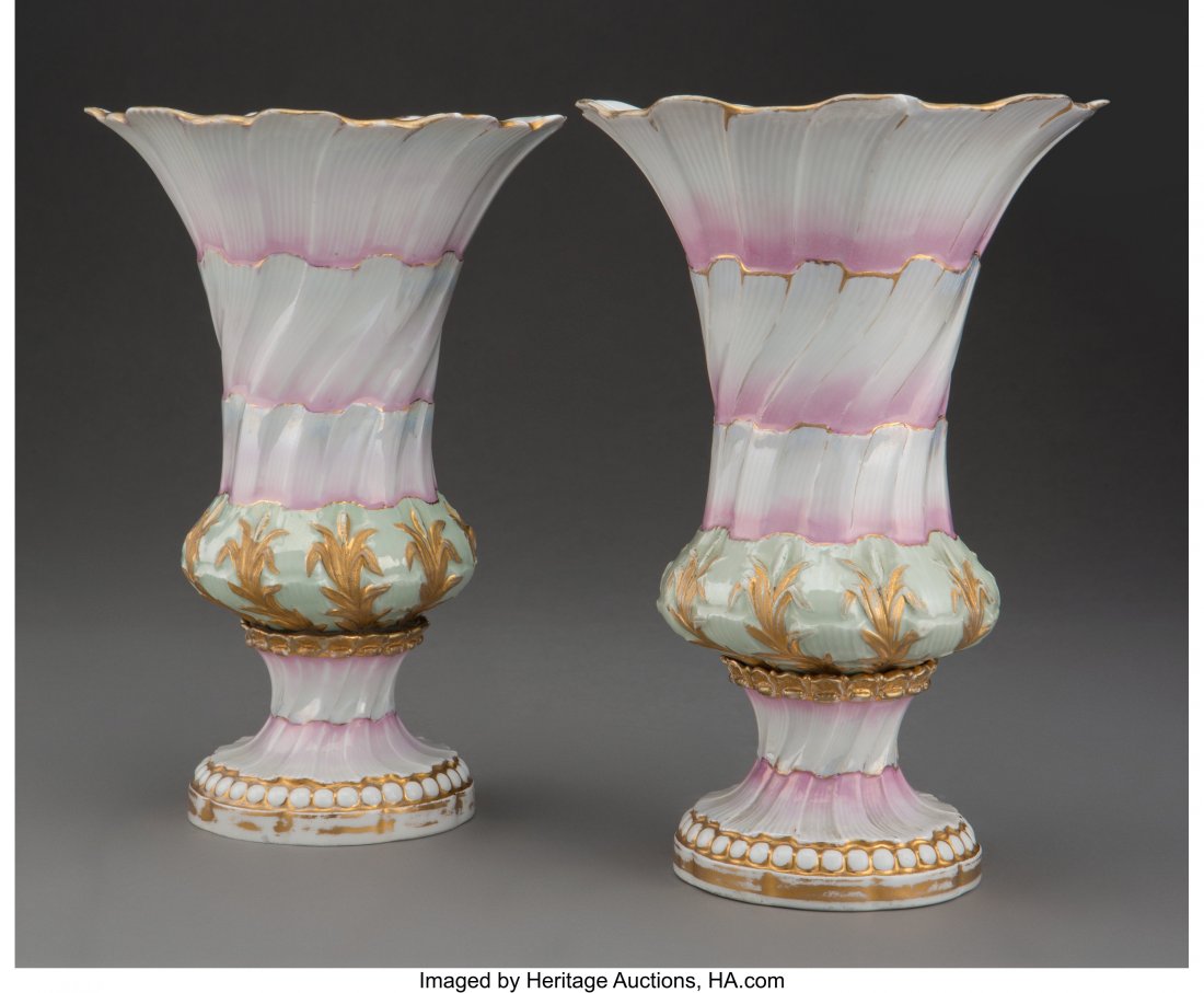 A Pair of Meissen Polychrome and Partial Guilt P: A Pair of Meissen Polychrome and Partial Guilt Porcelain Campana-Form Urns, Germany, 20th century Marks: (crossed swords in underglaze blue), .869, B 10-1/2 inches (26.7 cm) (each) PROPERTY FROM A LA