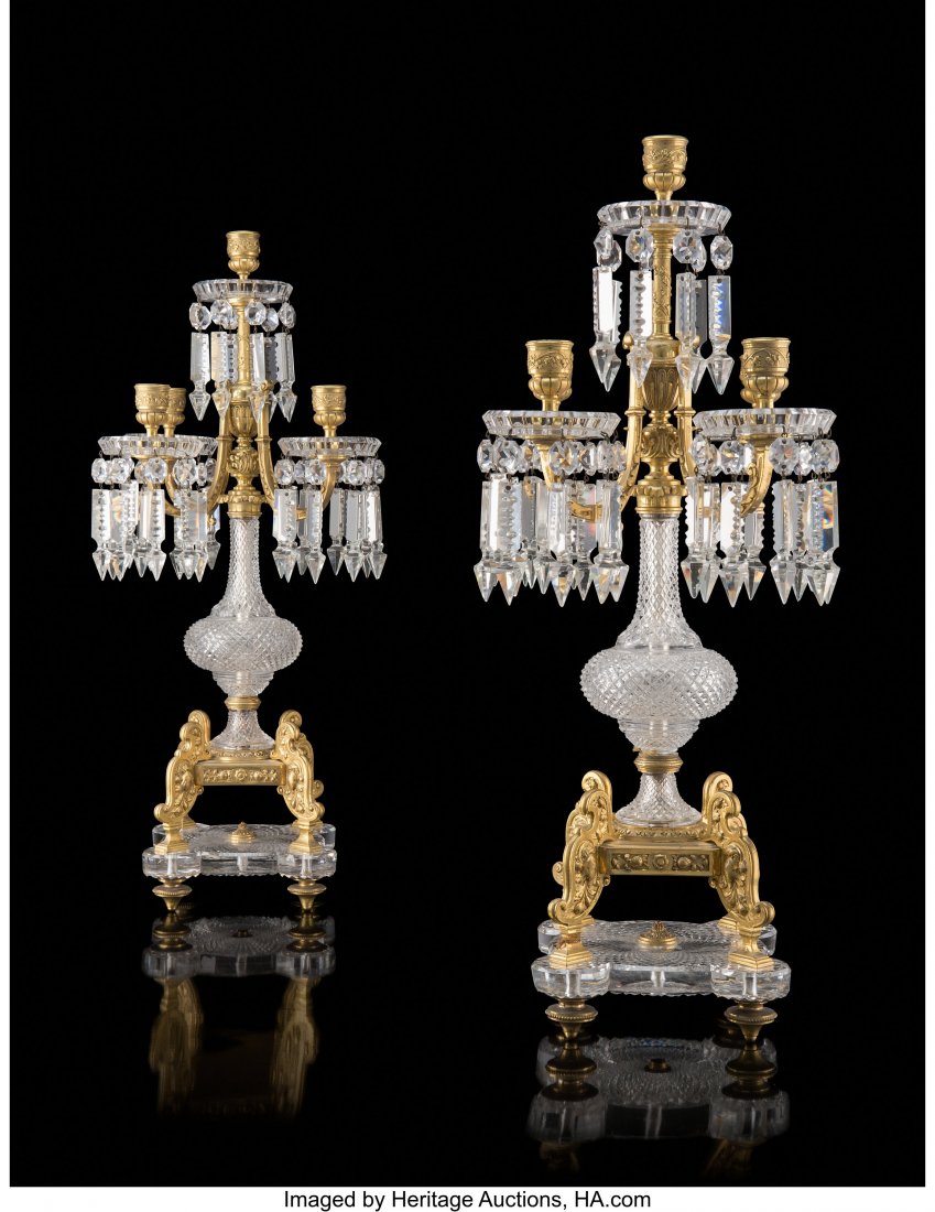 An Important Pair of Baccarat Cut Glass and Gilt: An Important Pair of Baccarat Cut Glass and Gilt Bronze Five-Light Candelabra, France, late 19th century Marks to fixing bolts on bases: (Baccarat trademark) Marks to crystal drip pans: BACCARAT 23-1/