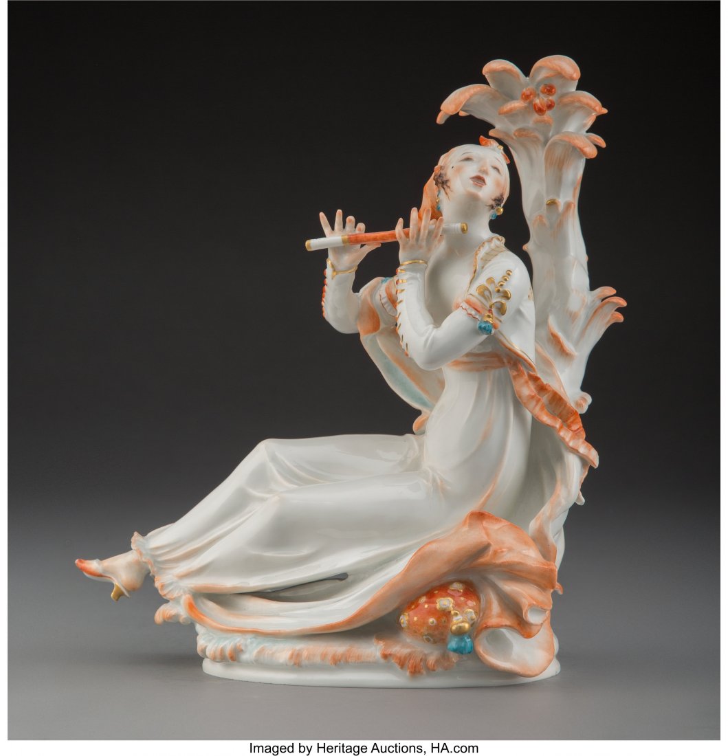 A Meissen Polychrome and Partial-Gilt Porcelain: A Meissen Polychrome and Partial-Gilt Porcelain Flute Player Figure, Germany, 19th century Marks: (crossed swords in underglaze blue-four slashes), A1146, 150 9 x 8 x 4 inches (22.9 x 20.3 x 10.2 cm)