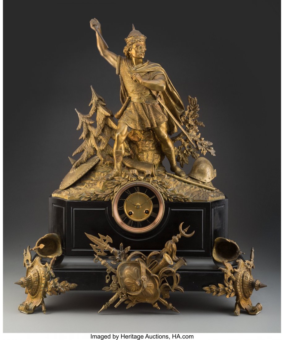 A Continental Gilt Bronze and Marble Figural Man: A Continental Gilt Bronze and Marble Figural Mantle Clock, late 19th century 27 x 22 x 7-3/4 inches (68.6 x 55.9 x 19.7 cm) The clock on a rectangular base with chamfered edges, gilt bronze mounted wa
