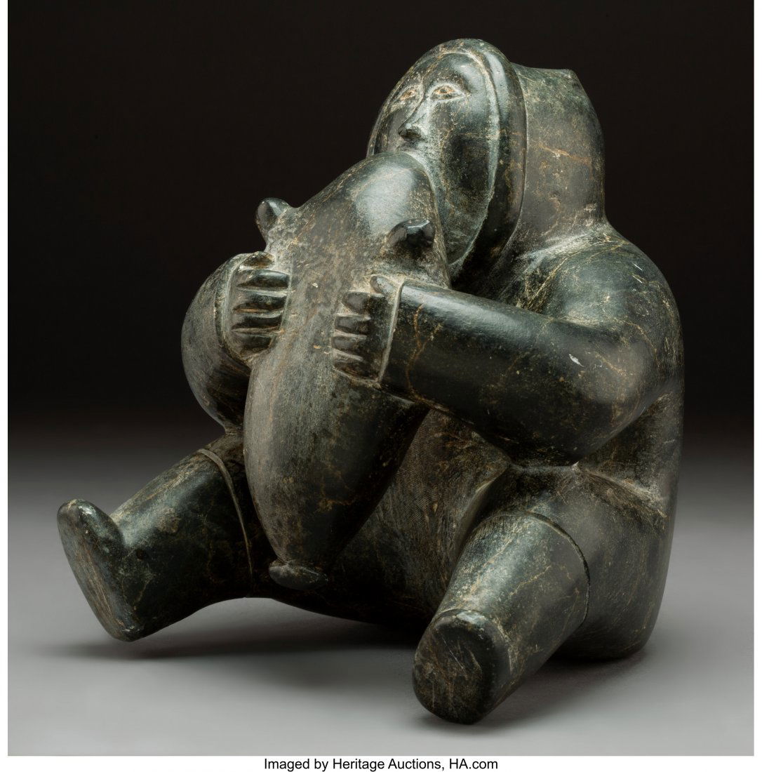 An Eskimo Stone Sculpture  c. 1950  carving of a (1 of 3)