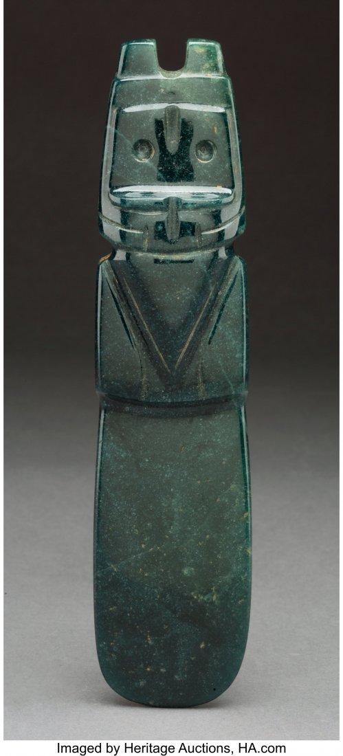 An Avian Axe God Pendant Costa Rica, c. 300 &#x: An Avian Axe God Pendant Costa Rica, c. 300 – 700 AD Hefty dark blue-green speckled jade in form of the Avian Axe God with a large beak, wings folded in, drilled eyes and groove on forehead for 