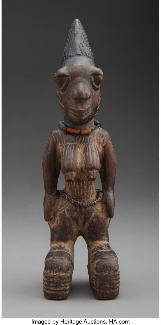 A Yoruba Female Twin Figure ere ibeji, Igbomin: A Yoruba Female Twin Figure ere ibeji, Igbomina, Igbomina state, Nigeria Height: 12 inches HID03101062020 © 2020 Heritage Auctions | All Rights Reserved