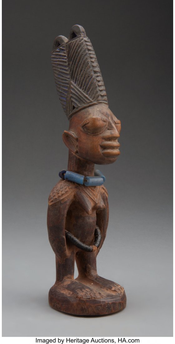 A Yoruba Female Twin Figure ere ibeji, Ila Oran: A Yoruba Female Twin Figure ere ibeji, Ila Orangun, Igbomina state, Nigeria Height: 10 &frac34; inches HID03101062020 © 2020 Heritage Auctions | All Rights Reserved