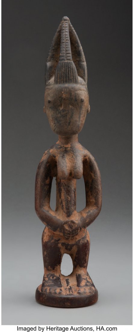 A Yoruba Female Twin Figure ere ibeji, Shaki, O: A Yoruba Female Twin Figure ere ibeji, Shaki, Oyo state, Nigeria Height: 11 &frac34; inches HID03101062020 © 2020 Heritage Auctions | All Rights Reserved