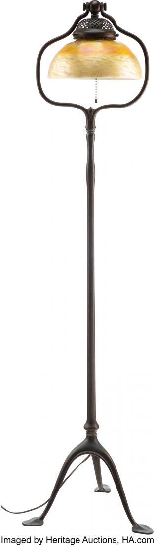 Tiffany Studios Damascene Favrile and Patinated : Tiffany Studios Damascene Favrile and Patinated Bronze Floor Lamp, circa 1910 Marks to shade: L.C.T. Marks to base: TIFFANY STUDIOS, NEW YORK, 423 55-1/2 inches (141.0 cm) The shade measures 9-3/4 inc