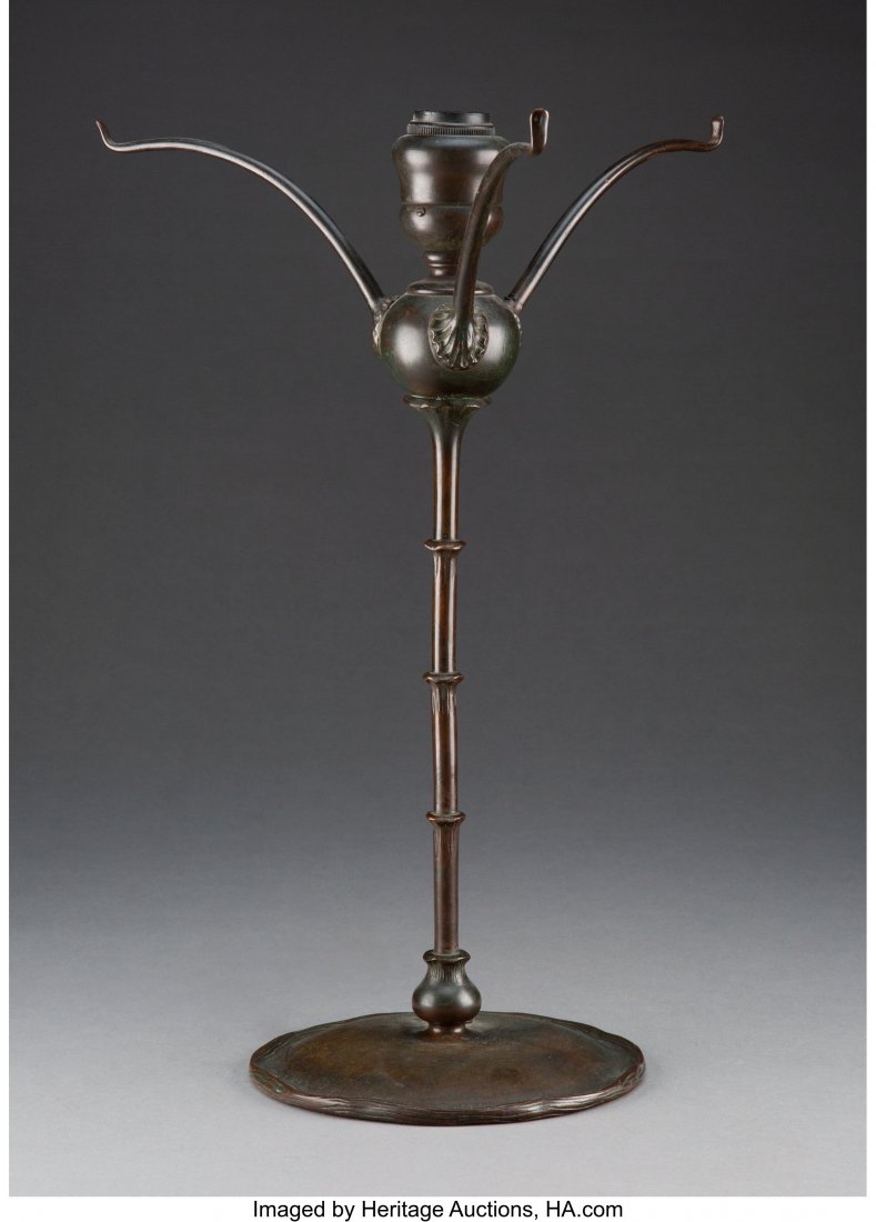 Tiffany Studios Patinated Bronze Lamp Base, circ: Tiffany Studios Patinated Bronze Lamp Base, circa 1910 Marks: TIFFANY STUDIOS, NEW YORK, 25867 15-3/4 x 11 inches (40.0 x 27.9 cm) HID03101062020 © 2020 Heritage Auctions | All Rights Reserved