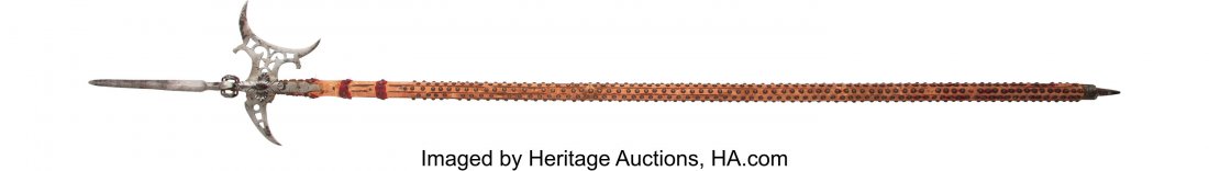European Halberd. Approximately 87-inches over: European Halberd. Approximately 87-inches overall. 10-inch head to the tip of the double sided spike. The axe blades are pierced and decorated with multiple elements including somewhat gothic patterns