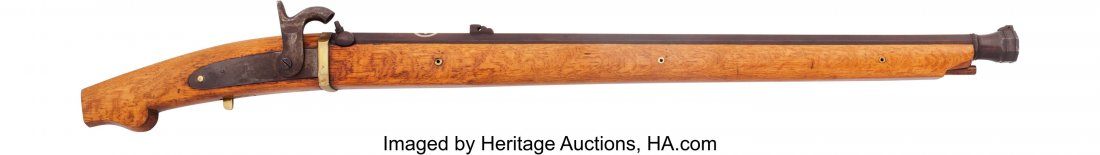 An Unusual Japanese Percussion Tanegashima with : An Unusual Japanese Percussion Tanegashima with Period Silver Mon Denoting Family Ownership. Approximately 50 caliber, 30-inch fully octagonal barrel. Extensive Meiji registration on left side of kash