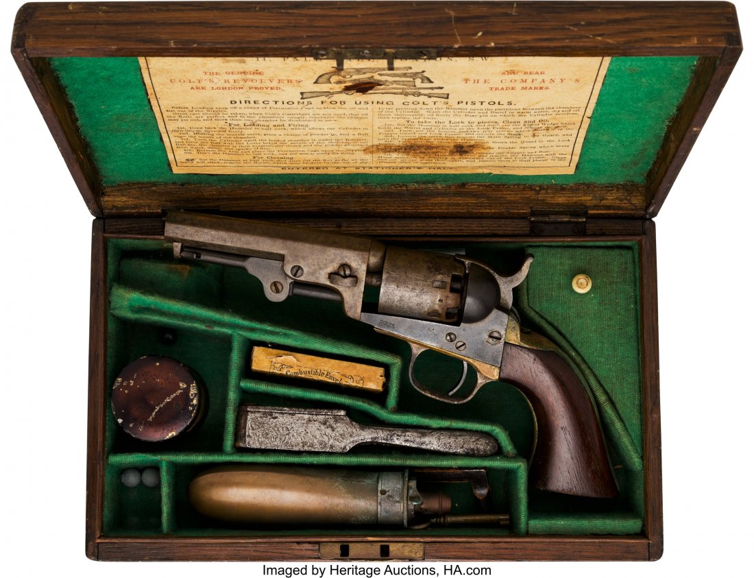 Cased Colt 1849 Pocket Percussion Revolver. Se: Cased Colt 1849 Pocket Percussion Revolver. Serial no. 223444 [barrel, frame, triggerguard, cylinder and butt], .31 caliber, 4-inch octagonal barrel with fixed front sight. Blued and case-hardened fin