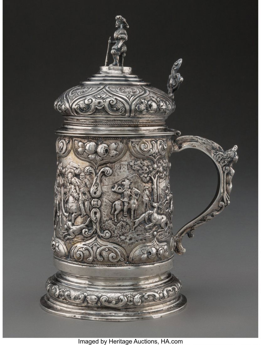 A German Repoussé Silver Tankard, Dresden: A German Repoussé Silver Tankard, Dresden, Germany, mid-late 19th century Marks: (crossed swords), (various) 9-1/2 inches (24.1 cm) 16.95 troy ounces HID03101062020 © 2020 Heritage Auction