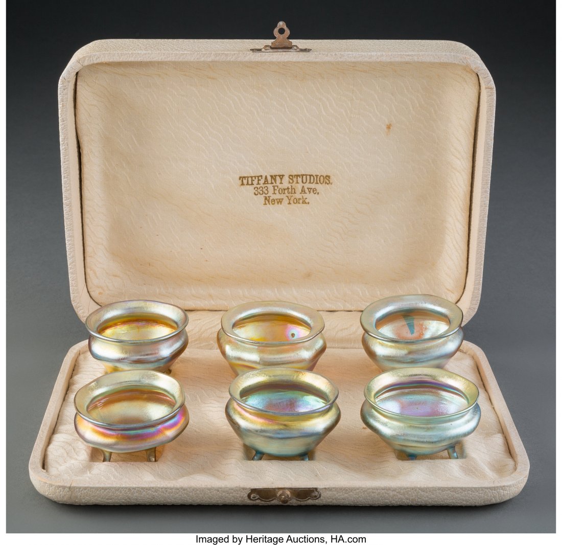A Six-Piece Set of Tiffany Studios Favrile Glass: A Six-Piece Set of Tiffany Studios Favrile Glass Open Salts in Fitted Case, early 20th century Marks: L.C.T., (various) 2 x 9 x 6-1/2 inches (5.1 x 22.9 x 16.5 cm) (case) HID03101062020 © 2020 He