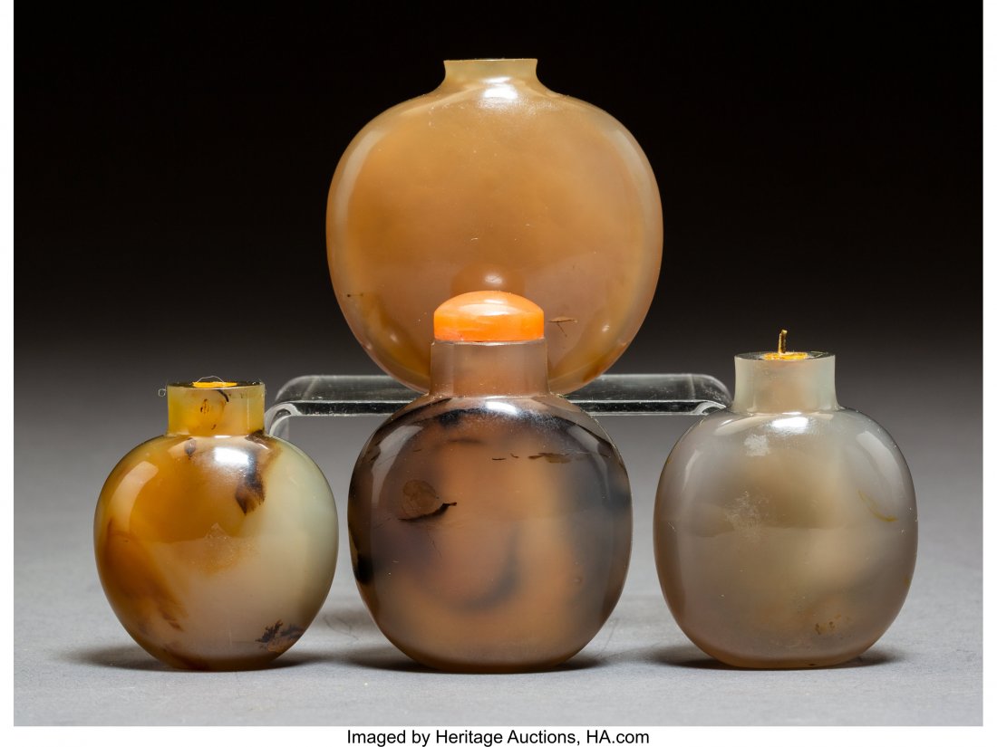A Group of Four Chinese Hardstone Snuff Bottles (1 of 2)