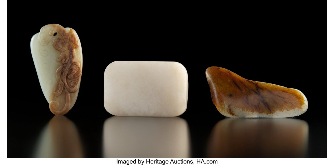 A Chinese Celadon and Russet Jade Pendant with a (1 of 2)