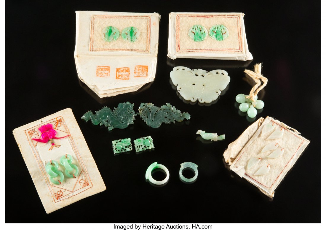 A Group of Twelve Chinese Jade Jewelry and Findi (1 of 2)
