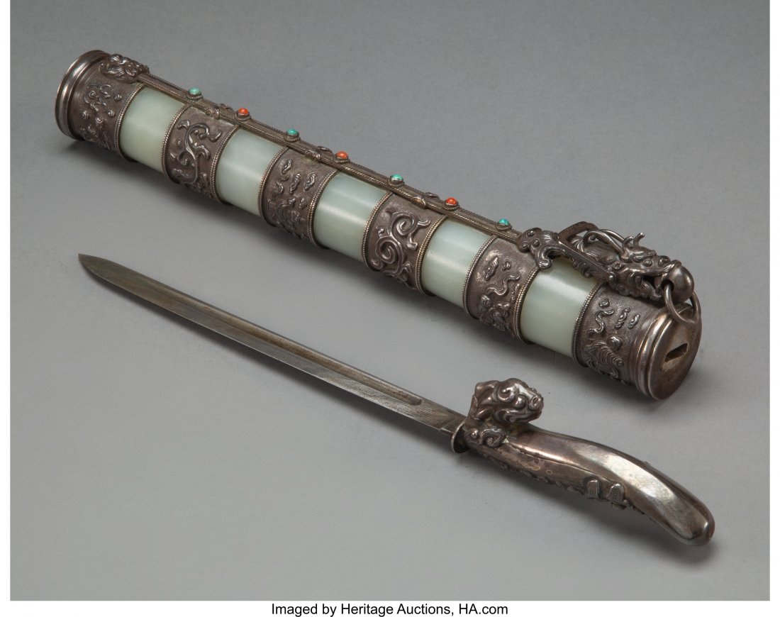 A Himalayan Cabochon-Mounted Silver and Pale Cel (1 of 3)