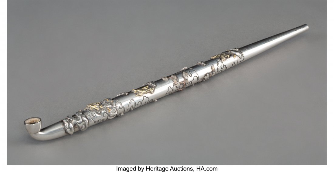 A Japanese Partial Gilt Repoussé Silver K: A Japanese Partial Gilt Repoussé Silver Kiseru, Meiji Period 10-1/8 x 0-1/2 inches (25.7 x 1.3 cm) 3.19 troy ounces HID03101062020 © 2020 Heritage Auctions | All Rights Reserved