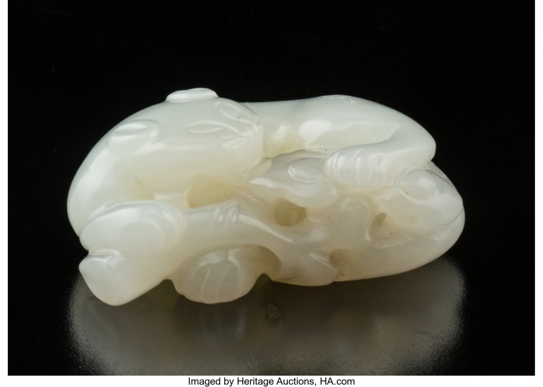 A Chinese White Jade Lion 0-1/2 x 1-5/8 x 1-1/8: A Chinese White Jade Lion 0-1/2 x 1-5/8 x 1-1/8 inches (1.4 x 4 x 2.7 cm) HID03101062020 © 2020 Heritage Auctions | All Rights Reserved