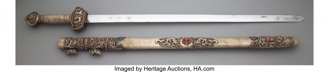 A Mongolian Metal Jian with Semi-Precious Stone-: A Mongolian Metal Jian with Semi-Precious Stone-Set Scabbard Marks: Three-character inscription to blade 37-3/4 x 3-1/2 x 2 inches (95.9 x 8.9 x 5.1 cm) HID03101062020 © 2020 Heritage Auctions | 