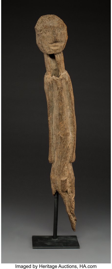 A Large Dogon Figure Mali, early to mid 20th ce: A Large Dogon Figure Mali, early to mid 20th century A highly eroded figure displaying fine old patina. Provenance: Dr. & Mrs. John Finley Height: 29 inches HID03101062020 © 2020 Heritage Auc