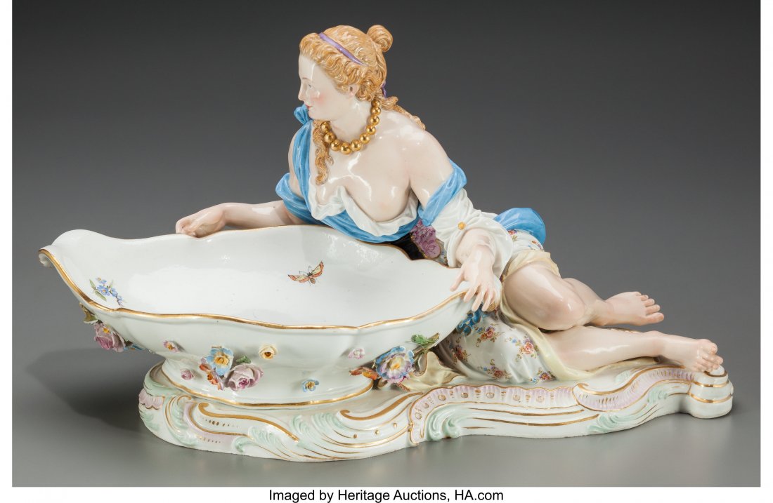 A Meissen Porcelain Figural Sweet Meat Dish, Mei: A Meissen Porcelain Figural Sweet Meat Dish, Meissen, Germany, late 19th century Marks: (crossed swords), 31, 2858, 145 7-1/4 inches high x 13 inches wide x 7 inches deep (18.4 x 33.0 x 17.8 cm) PROPE