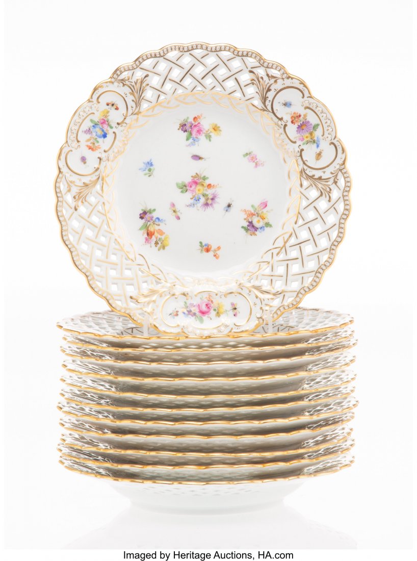 Twelve Meissen Partial Gilt Porcelain Bread and: Twelve Meissen Partial Gilt Porcelain Bread and Butter Plates with Reticulated Rims, German, late 19th-early 20th century Marks: (crossed swords in underglaze blue), (various potters' stamps) 8-1/4 in