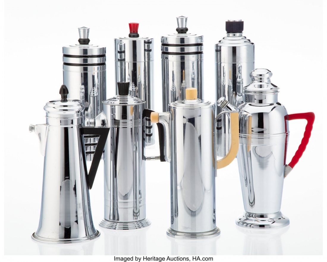 A Group of Eight Chromed Metal and Bakelite Cock: A Group of Eight Chromed Metal and Bakelite Cocktail Shakers, mid-20th century Marks to tallest: KEYSTONEWARE, CHROME PLATED 13-1/4 x 8 x 5 inches (33.7 x 20.3 x 12.7 cm) (tallest) HID03101062020 &cop