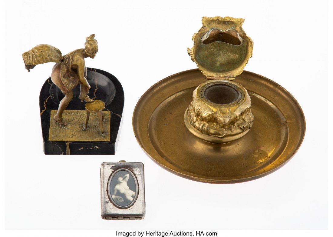 Two Continental Brass Figural Ashtrays and an Er: Two Continental Brass Figural Ashtrays and an Erotic Metal Cigar Cutter, early 20th century Marks to cigar cutter: PAT, APR, 14, 1914 4-1/4 x 5 x 3-5/8 inches (10.8 x 12.7 x 9.2 cm) (tallest) HID03101