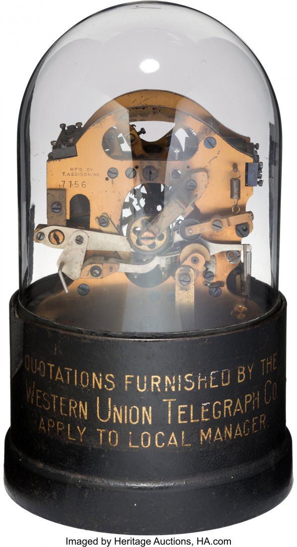 Western Union: Thomas A. Edison Stock Ticker Tap: Western Union: Thomas A. Edison Stock Ticker Tape Machine. Works stamped "M'f'd by T. A. Edison Inc. 7156". The heavy cast iron base has gold-leaf lettering on one side reading: "Quotations Furnished