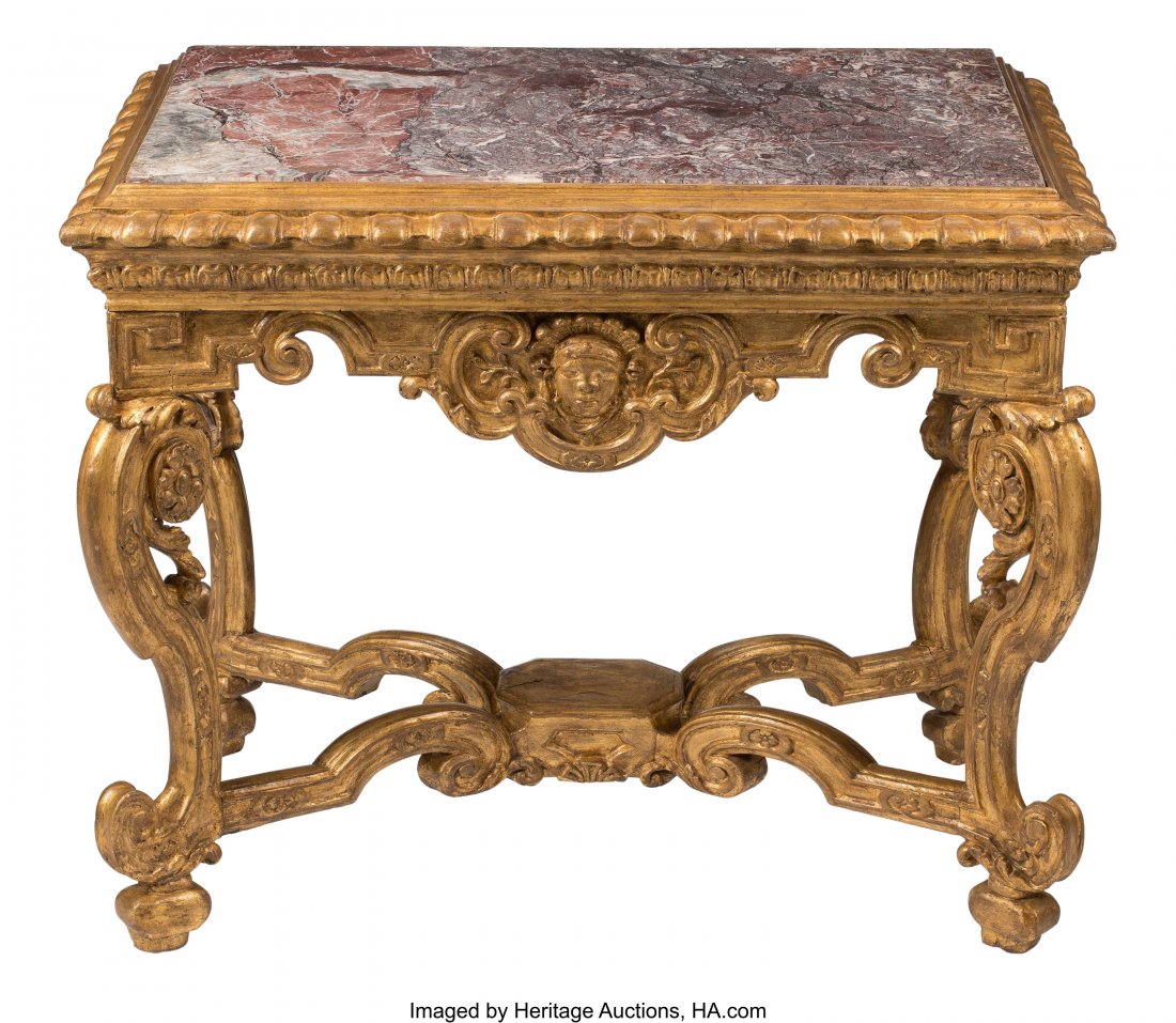 A Continental Baroque Carved Gilt Wood Console T: A Continental Baroque Carved Gilt Wood Console Table, second quarter 18th century 33 x 40 x 24-1/2 inches (83.8 x 101.6 x 62.2 cm) HID03101062020 © 2020 Heritage Auctions | All Rights Reserved