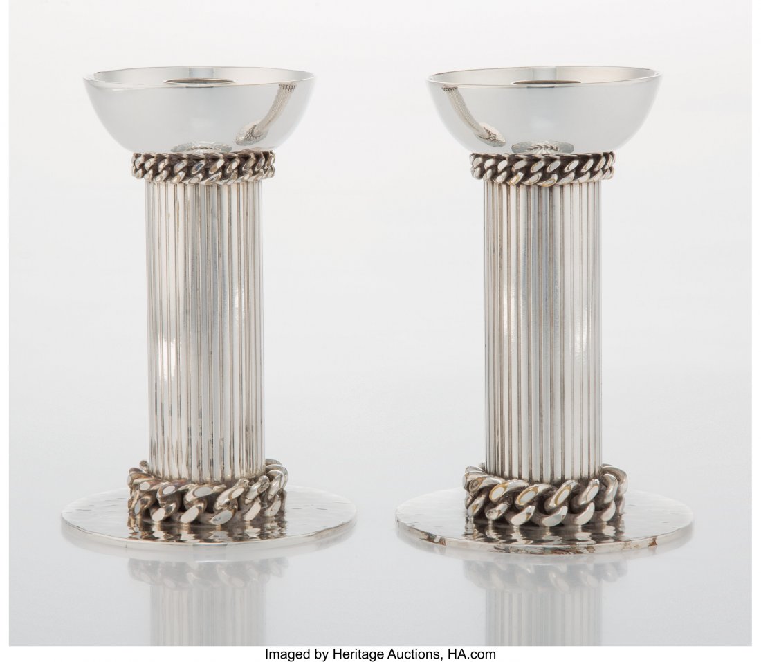 Jean Després (French, 1889-1980) Pair of: Jean Després (French, 1889-1980) Pair of Candlesticks Silver-plated metal 5-1/4 x 3-1/2 x 3-1/2 inches (13.3 x 8.9 x 8.9 cm) (each) Signed to underside Jean Després PROVENANCE: Galerie F
