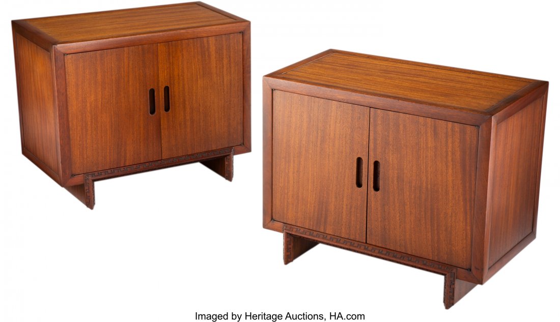 Frank Lloyd Wright (American, 1867-1959) Pair of: Frank Lloyd Wright (American, 1867-1959) Pair of Taliesin Cabinets, circa 1950, Henredon Mahogany 25 x 31 x 17 inches (63.5 x 78.7 x 43.2 cm) (each) Branded to each interior (encircled HH), Heritage H