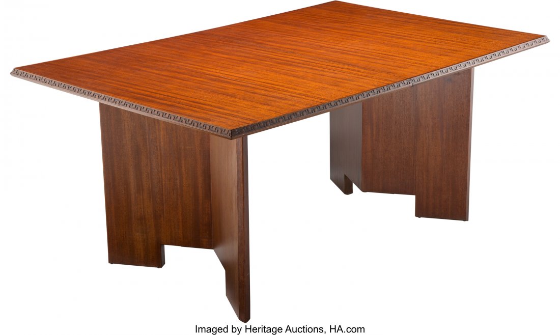 Frank Lloyd Wright (American, 1867-1959) Taliesi: Frank Lloyd Wright (American, 1867-1959) Taliesin Extending Dining Table, circa 1950, Henredon Mahogany 28-1/2 x 64 x 42 inches (72.4 x 162.6 x 106.7 cm) (excluding leaf) Inscribed to underside Herita
