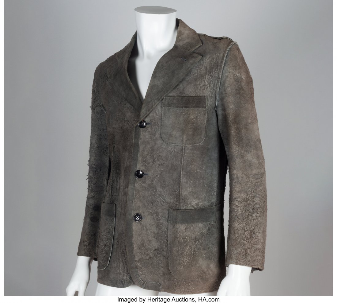 Rei Kawakubo (Japanese, b. 1942) and Comme des G: Rei Kawakubo (Japanese, b. 1942) and Comme des Garçons (Japanese, founded 1973) Distressed Single-Breasted Jacket, 2002 Cowhide Marked Size: L (JP) Chest: 21 inches Shoulder: 18-1/2 inches Leng