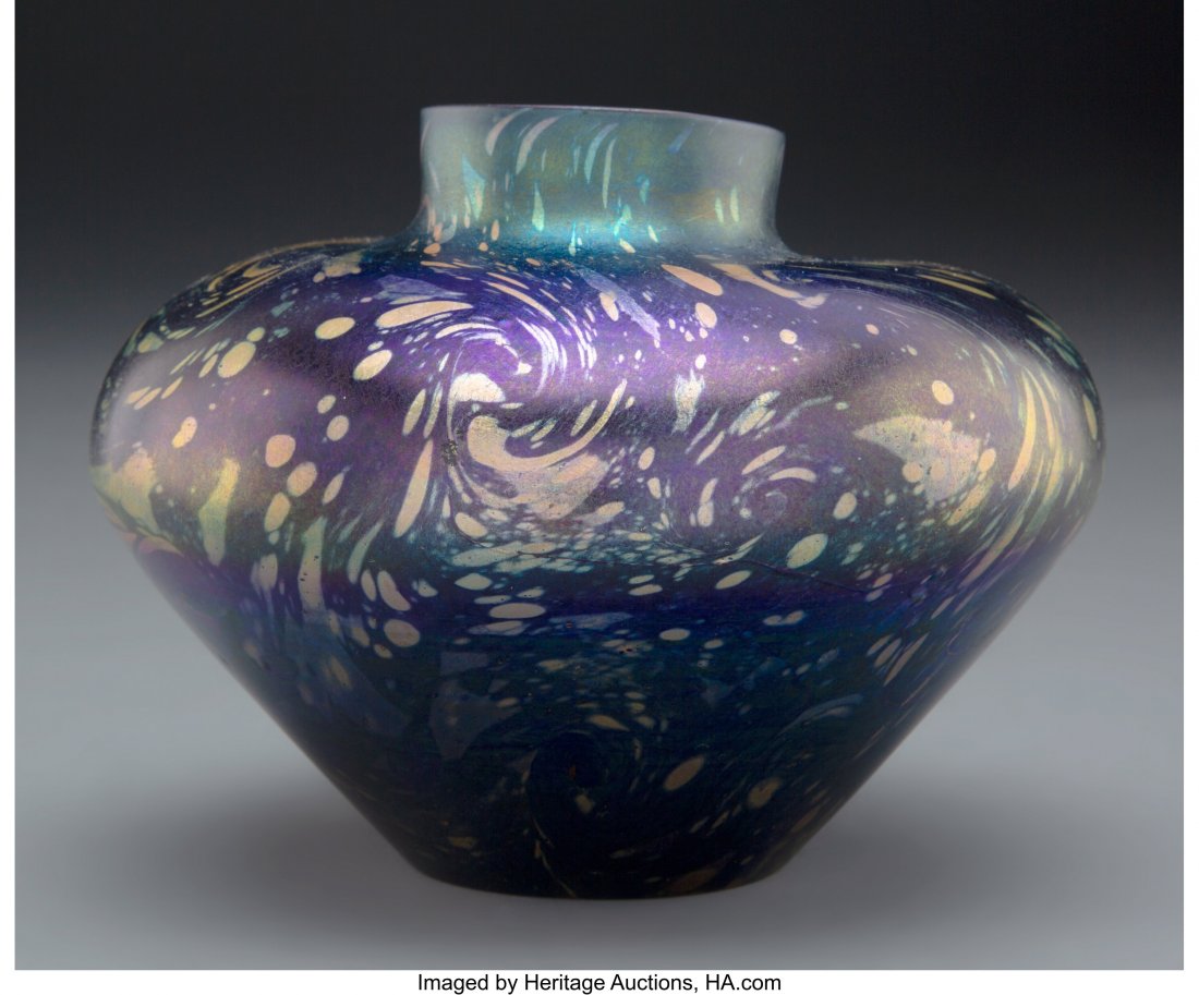Tiffany Studios Favrile Glass Vase, circa 1900 M: Tiffany Studios Favrile Glass Vase, circa 1900 Marks: L.C.T., K985, (TGD Co. paper label) 4-5/8 inches (11.7 cm) HID03101062020 © 2020 Heritage Auctions | All Rights Reserved