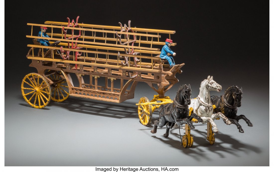 Cast Iron Hook and Ladder Fire Wagon with Three: Cast Iron Hook and Ladder Fire Wagon with Three Horse Team 28-3/4 x 7 x 9-3/4 inches (73.0 x 17.8 x 24.8 cm) The lot includes four wooden ladders. HID03101062020 © 2020 Heritage Auctions | All Ri