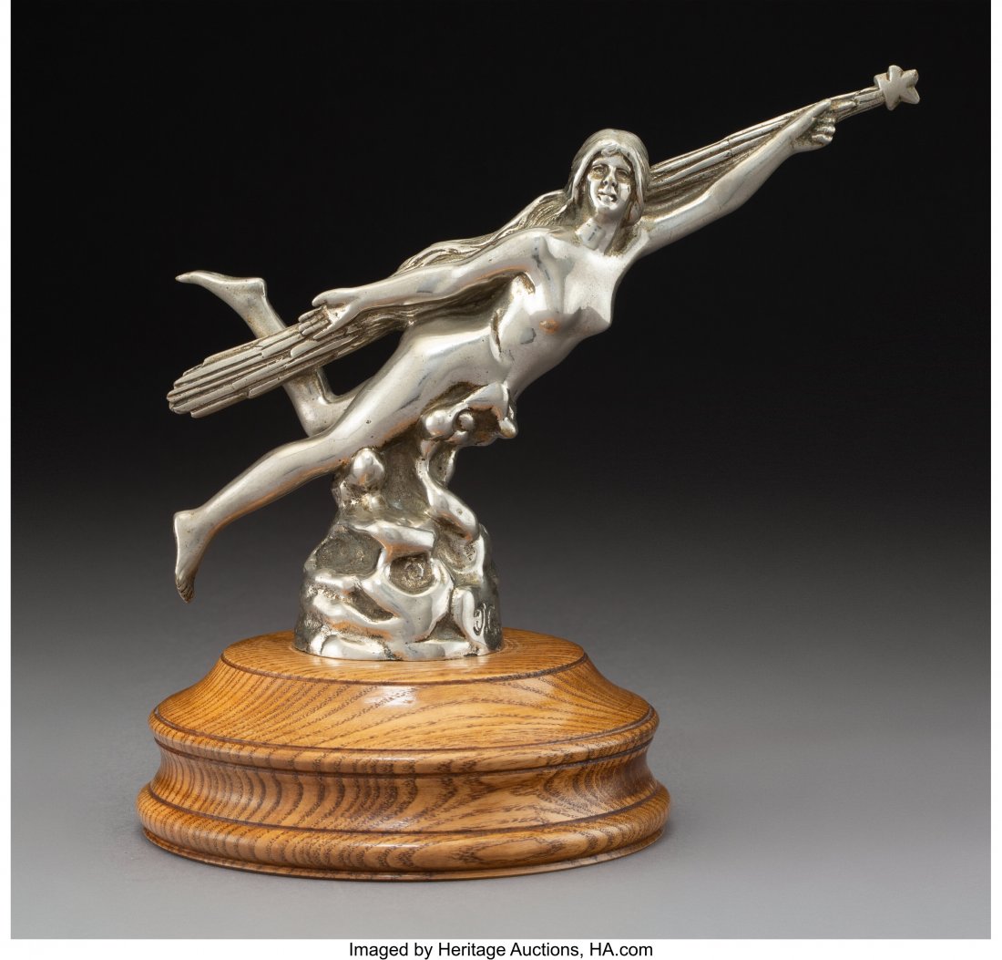 Jean Garnier Chromed Bronze Etoile Filant Automo: Jean Garnier Chromed Bronze Etoile Filant Automobile Mascot, circa 1905 Marks: J. Garnier 5-3/4 inches (14.6 cm) (excluding base) HID03101062020 © 2020 Heritage Auctions | All Rights Reserved