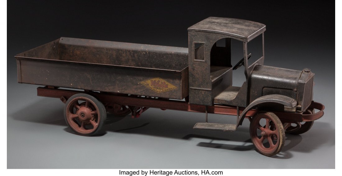 Kelmet Pressed Steel Mechanical White "Big Boy": Kelmet Pressed Steel Mechanical White "Big Boy" Dump Truck Model Marks: White, "Big Boy", KELMET CORP. 200 FIFTH AVE., NEW YORK, N.Y. 26-1/4 x 10 x 8-1/4 inches (66.7 x 25.4 x 21.0 cm) The truck featu