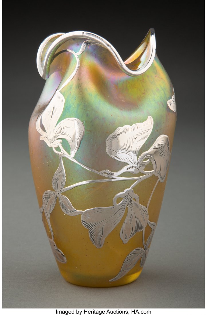 A Loetz Silberiris Glass Vase with La Pierre Sil: A Loetz Silberiris Glass Vase with La Pierre Silver Overlay, circa 1900 Marks: L, STERLING 5-1/4 inches (13.3 cm) HID03101062020 © 2020 Heritage Auctions | All Rights Reserved