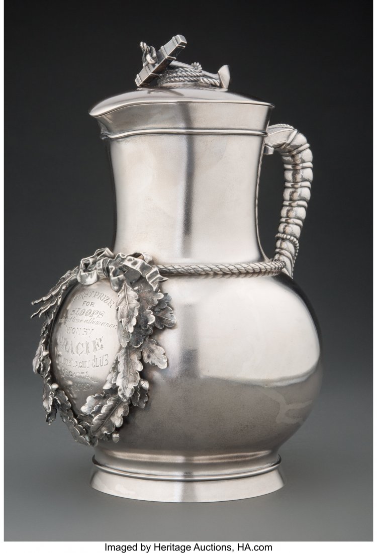 A Tiffany & Co. Satin Finished Silver: A Tiffany & Co. Satin Finished Silver Covered Trophy Jug with Cast Nautical Finial, New York, circa 1872 Marks: TIFFANY & Co., 2192, QUALITY 925-1000, 04489, UNION SQUARE, M 11-1/2 x 8 x 6-3/4 inches 