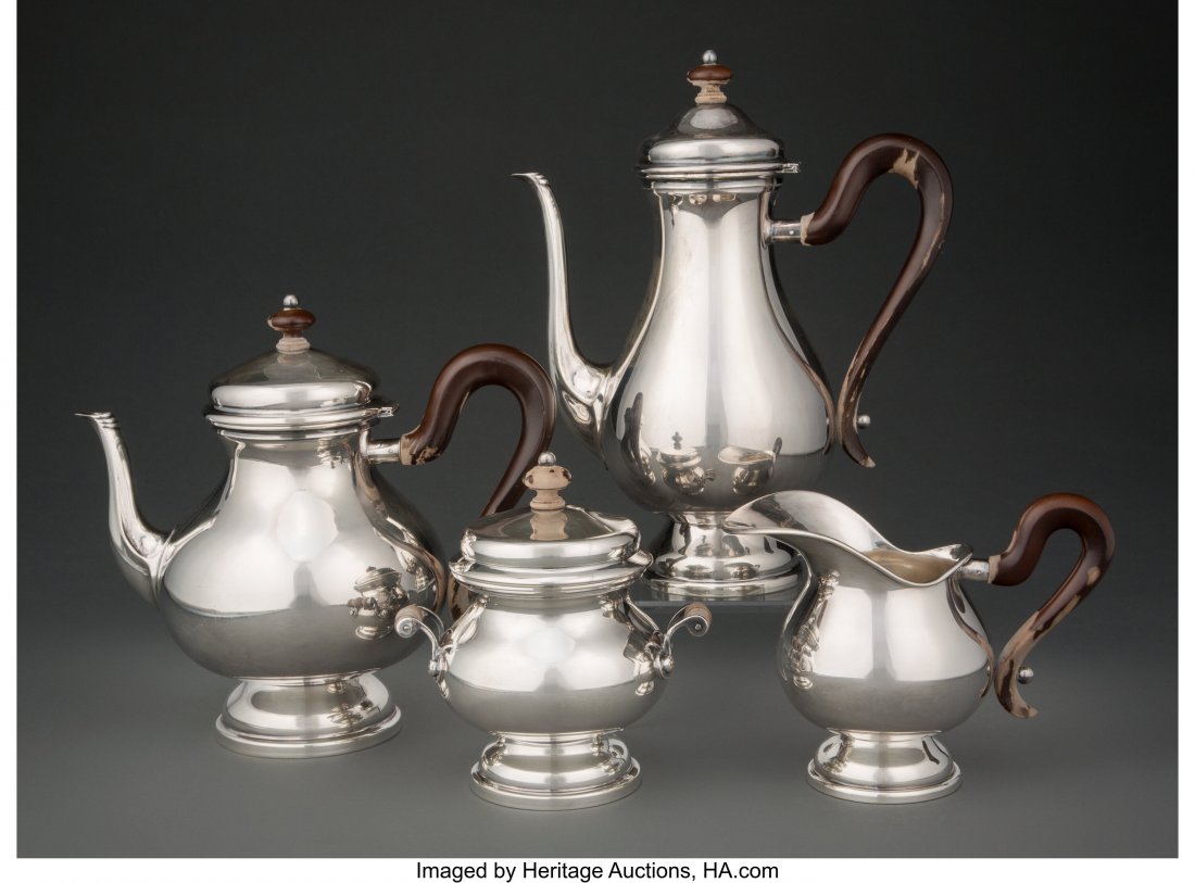 A Four-Piece Buccellati Silver Coffee and Tea Se: A Four-Piece Buccellati Silver Coffee and Tea Service with Wood Handles, late 20th century Marks: BUCCELLATI, STERLING, MADE IN ITALY 10-1/4 inches (26.0 cm) (tallest, coffee pot) 68 ounces (gross) Th