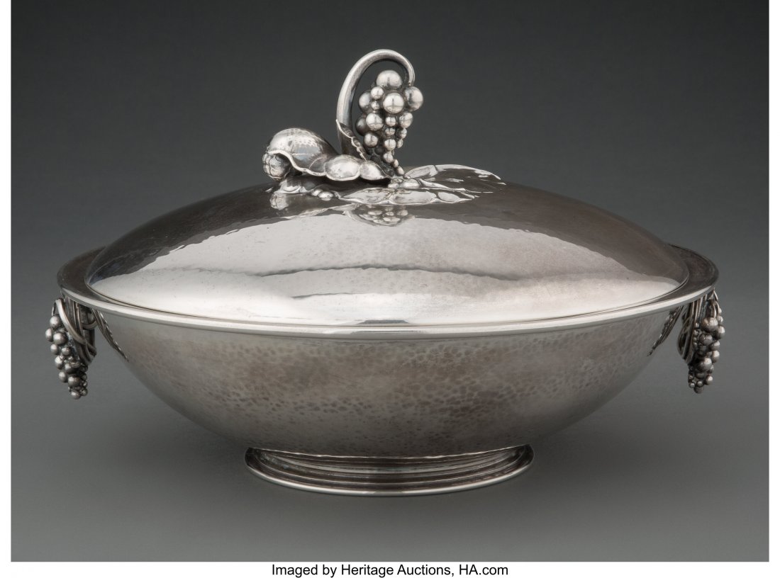 A Georg Jensen 408E Pattern Silver Covered Dish: A Georg Jensen 408E Pattern Silver Covered Dish, Copenhagen, designed 1925 Marks: 925.S, DENMARK, STERLING, 408, E 6-1/2 x 9-1/2 inches (16.5 x 24.1 cm) 44.48 troy ounces HID03101062020 © 2020 He