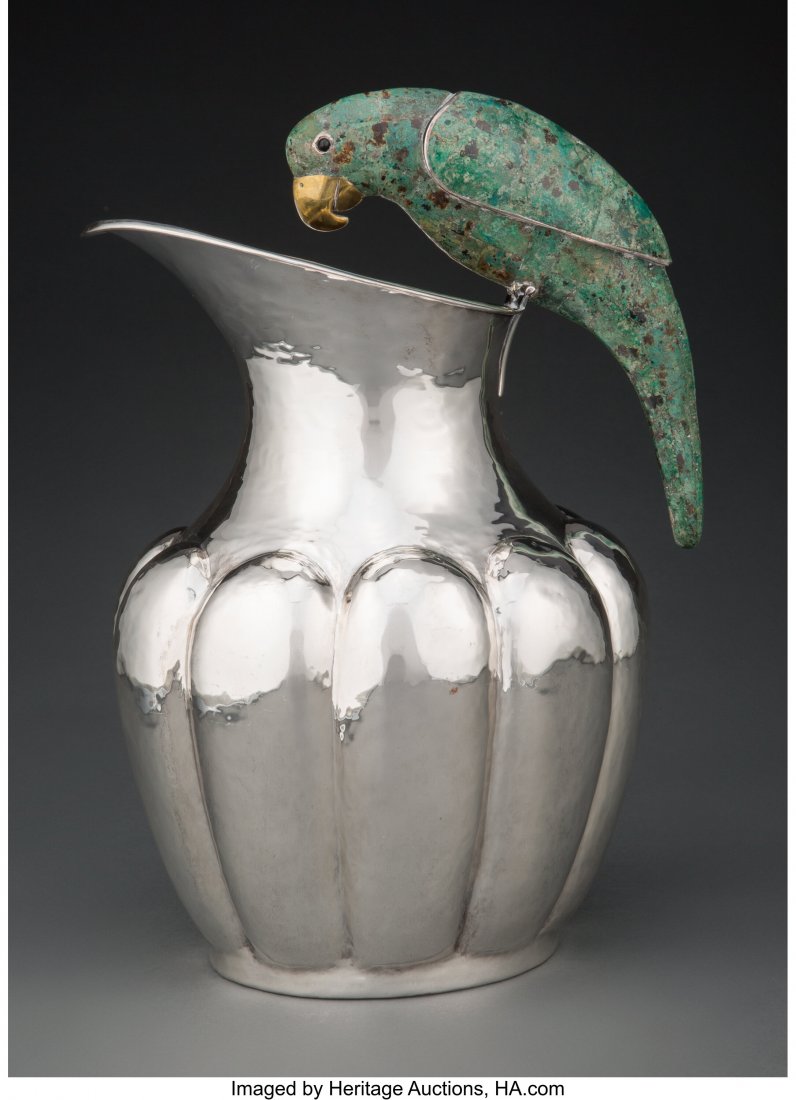 A Los Castillo Silver-Plated Brass Pitcher with : A Los Castillo Silver-Plated Brass Pitcher with Malachite-Veneered Parrot-Form Handle, Taxco, Mexico, circa 1965 Marks: PLATEADO, LOS CASTILLO, TAXCO, TA-01 11-1/4 x 8 x 6-3/4 inches (28.6 x 20.3 x 17