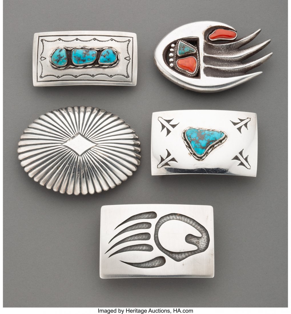 Five Southwest Belt Buckles c. 1970 four Navaj: Five Southwest Belt Buckles c. 1970 four Navajo and one Hopi example, silver, turquoise, coral Provenance: From the L. D. Bax Collection Widths: ranging from 3 to 3 &frac34; inches HID03101062020 