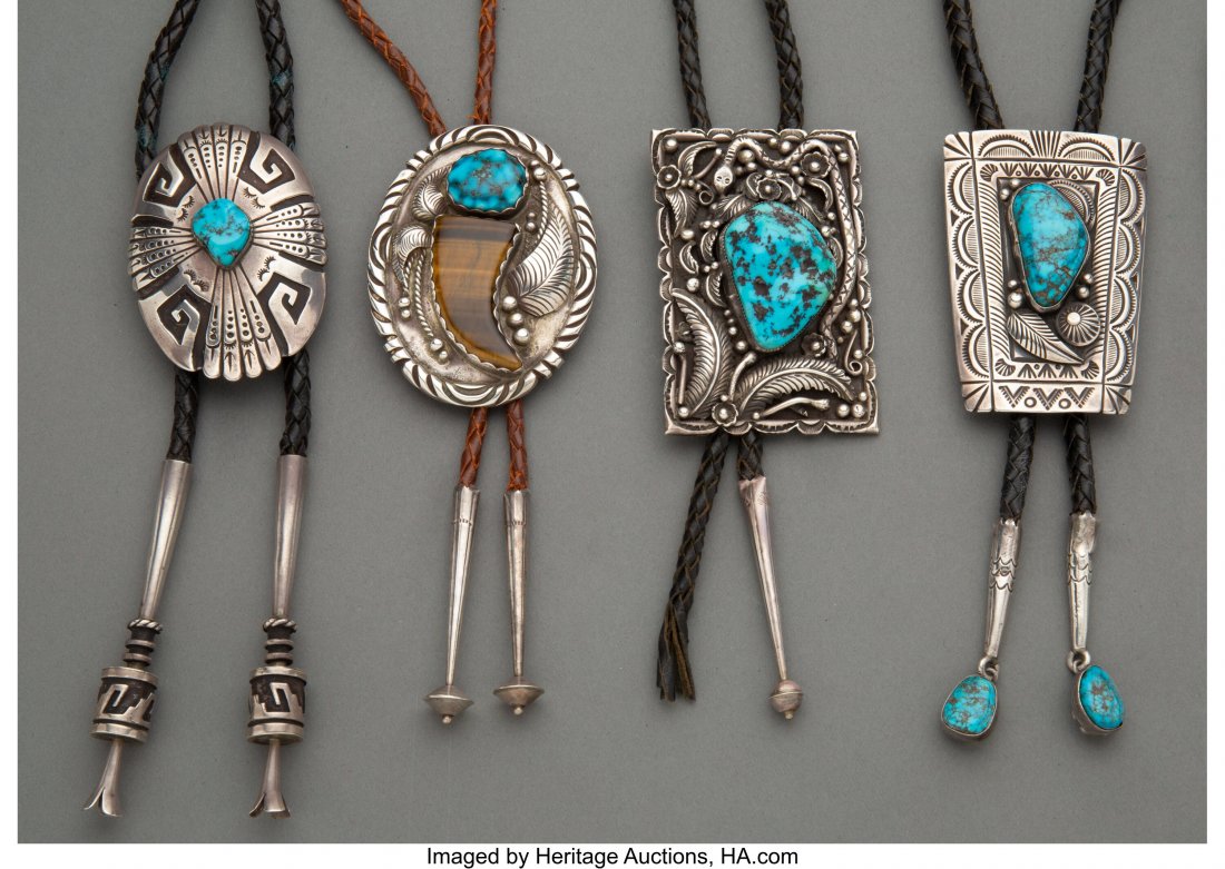Four Navajo Bolo Ties c. 1980 - 2000 silver, t: Four Navajo Bolo Ties c. 1980 - 2000 silver, turquoise, tiger's eye, one stamped Thomas Singer; another stamped Tom Willeto; another stamped LH Height of slides: ranging from 2 &frac12; to 3 inche
