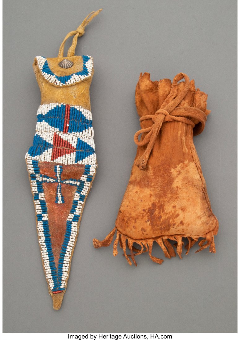Two Plains Hide Pouches c. 1880 one, a Ute bea: Two Plains Hide Pouches c. 1880 one, a Ute beaded hide tail bag, the other, a Northern Plains or Plateau drawstring pouch, containing two bead necklaces; hide, pigments, glass seed beads, globular bra