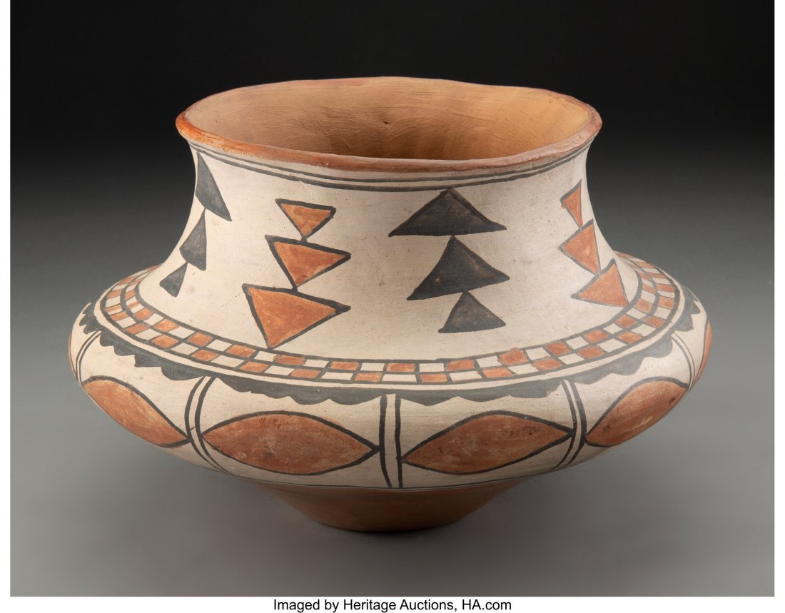 A San Ildefonso Polychrome Jar Maria Poveka c.: A San Ildefonso Polychrome Jar Maria Poveka c. 1890 clay, paint, with ink signature on the base Maria Poveka; accompanied by two polaroid photographs, one of the artist holding the pot and the other o