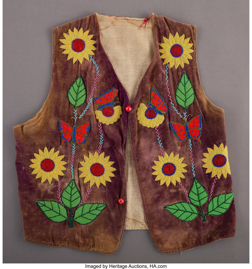 A Plateau Beaded Cloth Vest c. 1920 velvet, co: A Plateau Beaded Cloth Vest c. 1920 velvet, cotton and silk cloth, brass and glass seed beads, paper, thread, wood buttons Provenance: From the L. D. Bax Collection Length: 21 inches HID03101062020 &c