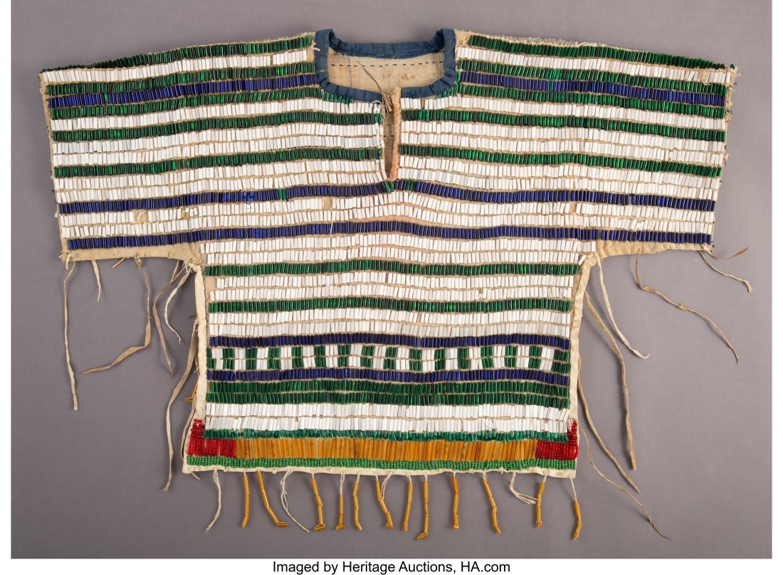 A Plateau Beaded Yoke c. 1920 canvas, real and: A Plateau Beaded Yoke c. 1920 canvas, real and tubular glass beads, cotton cloth, cotton string, hide Provenance: From the L. D. Bax Collection Length: 22 &frac14; inches HID03101062020 © 202